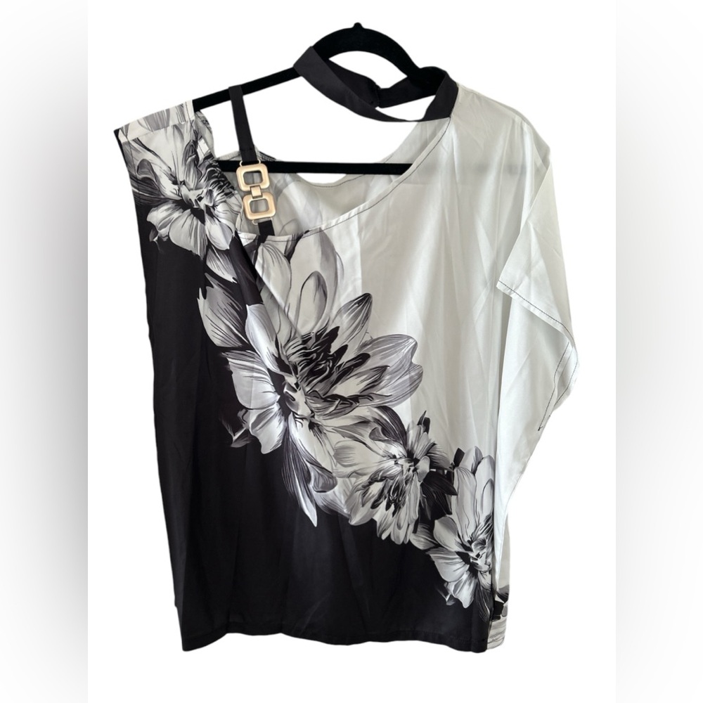 Get ready for next Summer with this beautiful off the shoulder dress shirt.